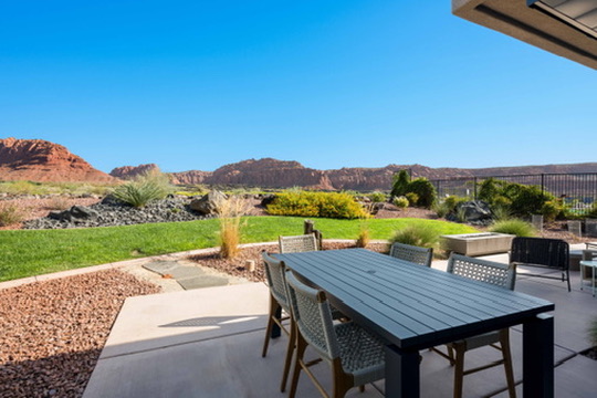 Patio dining with red rock panorama